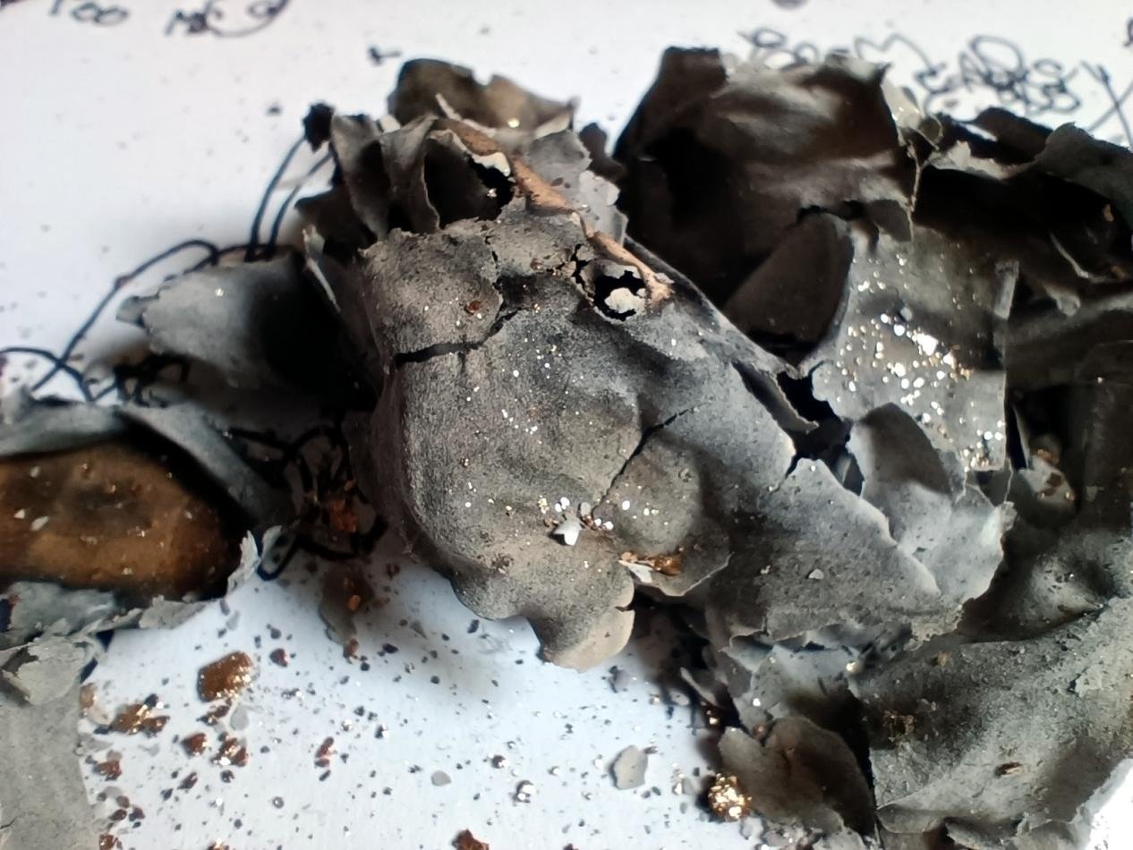 Close-up of the ashes and inscriptions in Untitled (ritual with ashes)