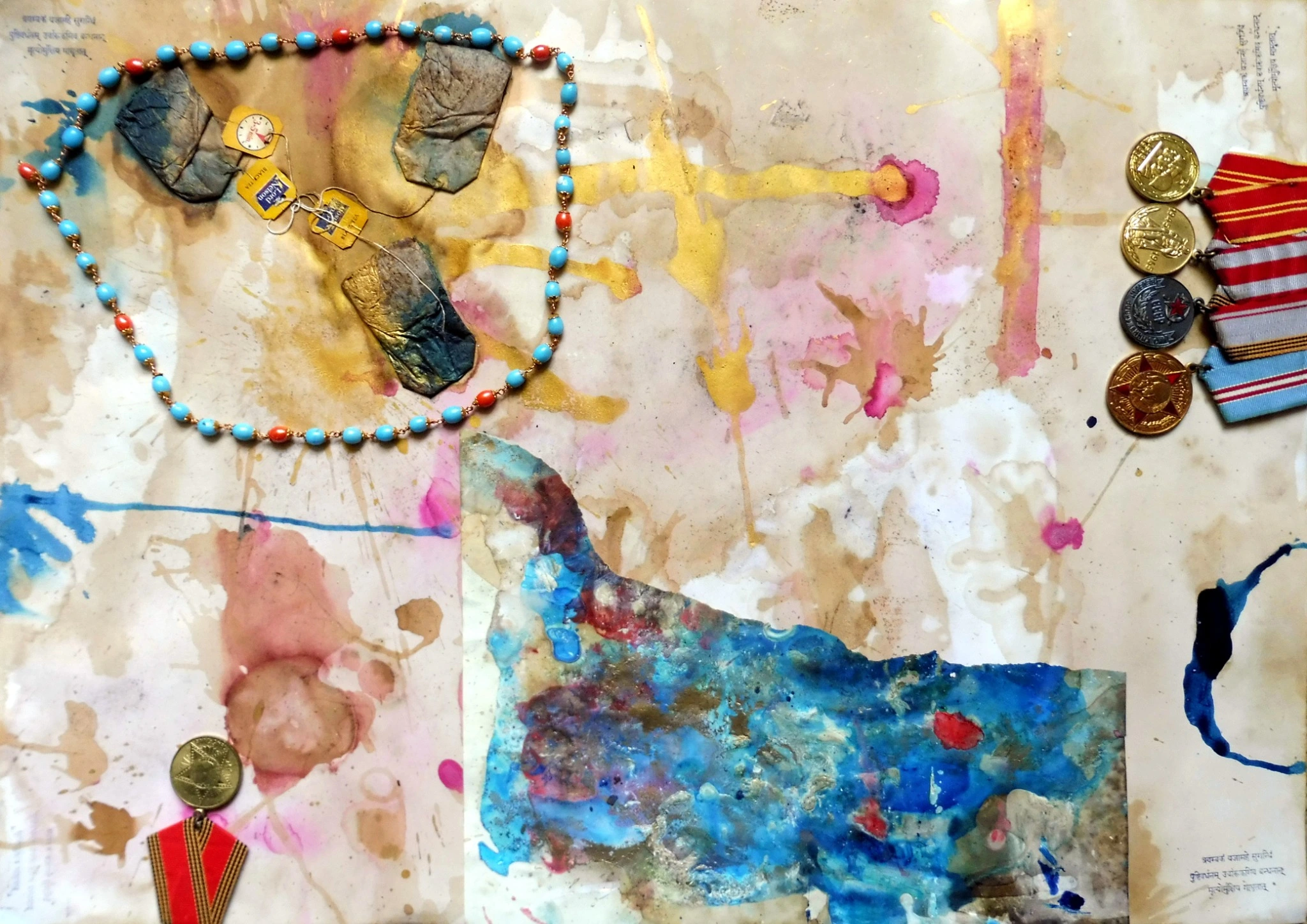 Coloured washes, objects and threads across paper