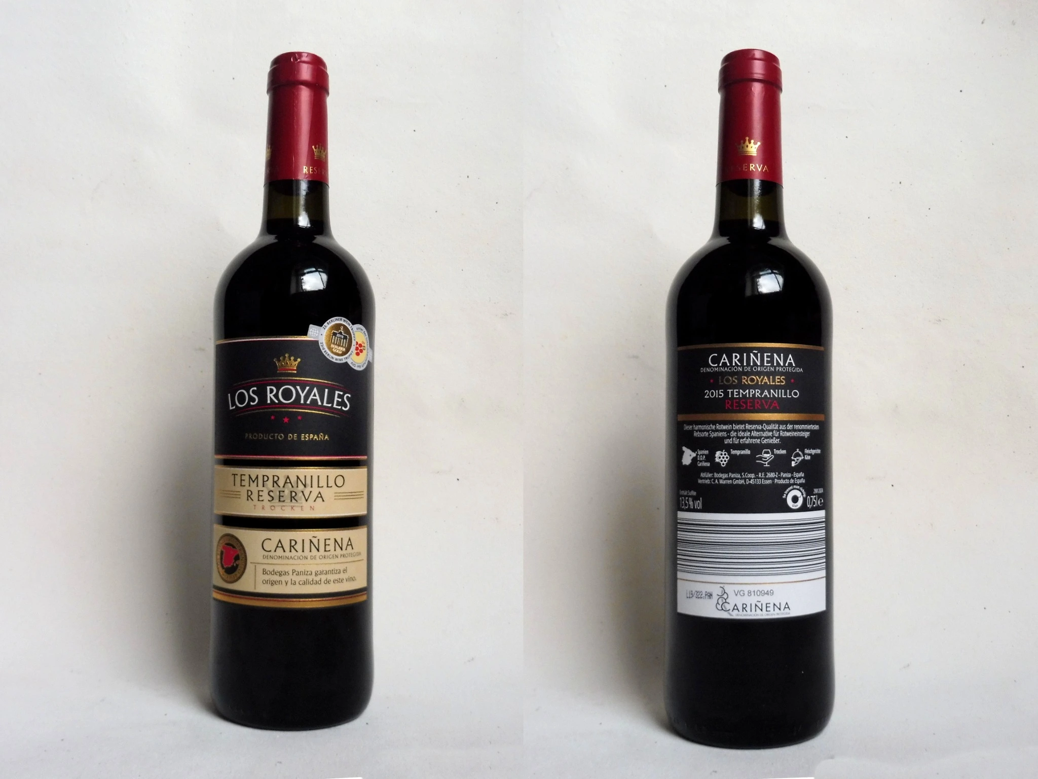 Two red wine bottles, before the addition of clay and embedded materials