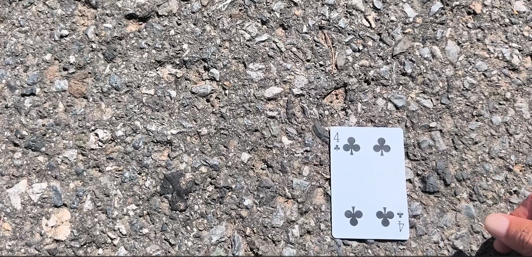 Discovery 02: 4♣, documented beside the road in Kep